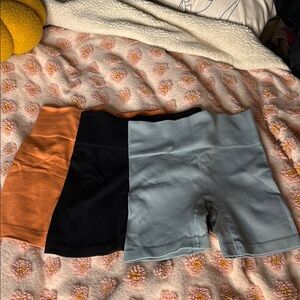 Trio of Ribbed Biker Shorts in Orange, Black, and Light Blue